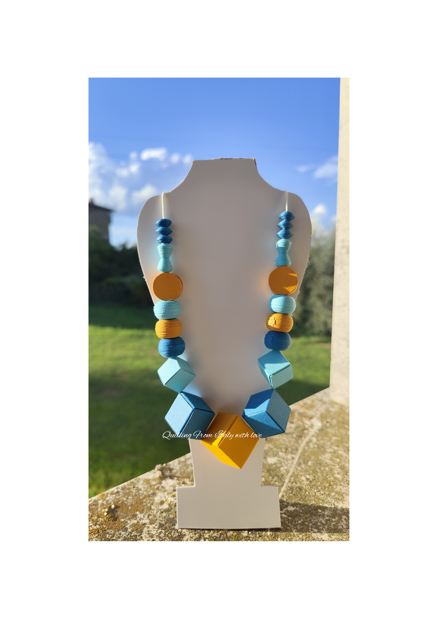 Paper necklace made with the quilling technique